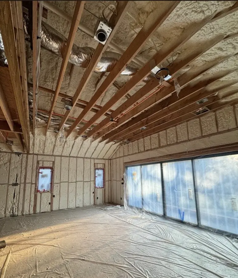 Interior walls and ceiling insulated with spray foam during new construction in Perry Heights